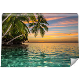 Fototapeta Zachód słońca ze wspaniałymi kolorami na tropikalnej wyspie 