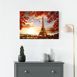 Obraz na płótnie Wieża Eiffla - kompozycja z jesiennymi liśćmi 