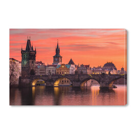 Obraz na płótnie Most Karola w Pradze z czerwonym zmierzchem w tle - Czechy