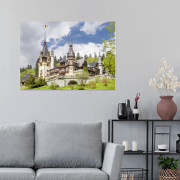 Plakat samoprzylepny Zamek Peles w Rumunii na tle zachmurzonego nieba