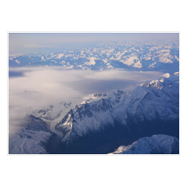 Plakat samoprzylepny Góry zasypane śniegiem widziane z samolotu