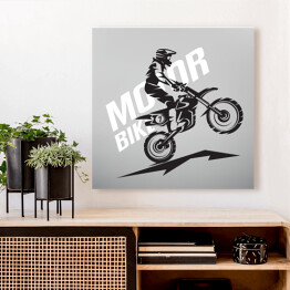 Obraz na płótnie Zarys motocyklisty jadącego na jednym kole