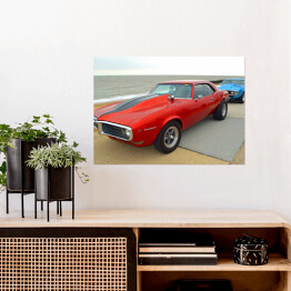 Plakat Czerwony samochód Pontiac Firebird w stylu vintage