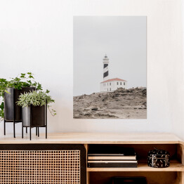 Plakat Latarnia morska na skałach. Kreatywny, minimalny, jasny i przewiewny stylizowany koncept.