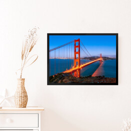 Obraz w ramie Golden Gate Bridge w San Fransisco w Kalifornii rozświetlone złotymi światłami