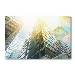 Obraz na płótnie Nowoczesny budynek mocno oświetlony promieniami słońca