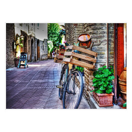 Plakat Stary rower z drewnianą skrzynią przy ścianie z cegły w San Gimignano